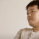 Do Kwon staring up at the ceiling in a desk chair.